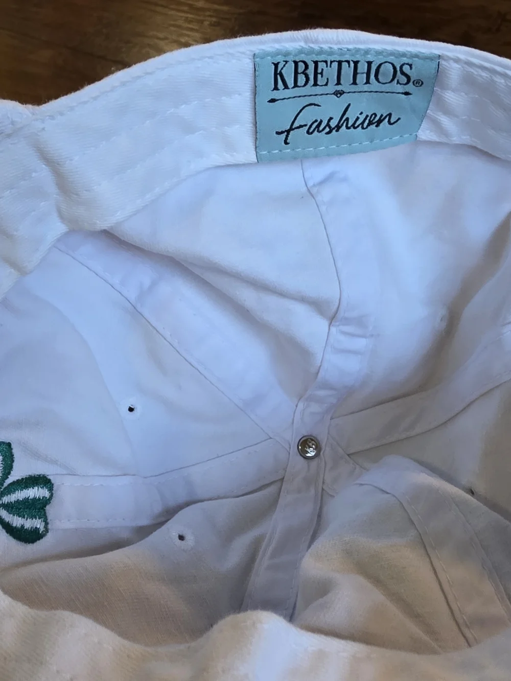 KBETHOS White Cap with Green Shamrock Accent